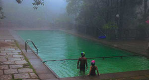 swimming pool at vythiri Resort